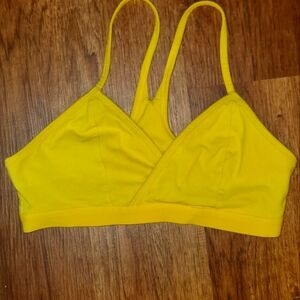 Yellow cross heart sports bra